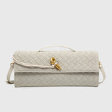 CHERRY™ – LUKSUS FLETTET SUEDE-CLUTCH